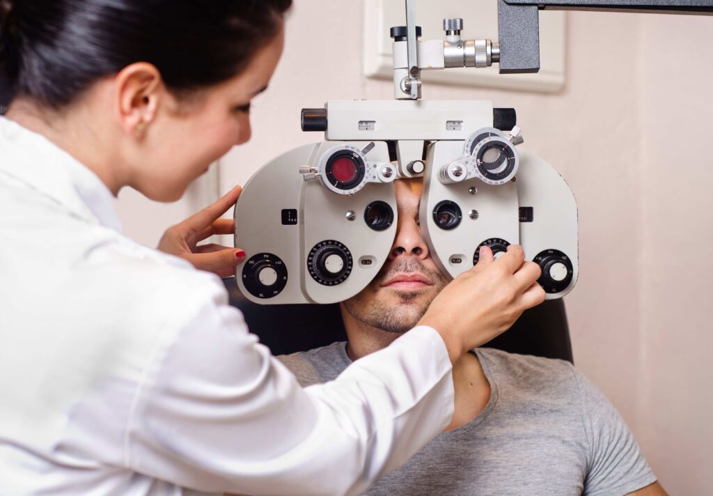 Optometrist woman looking phoropter calibration