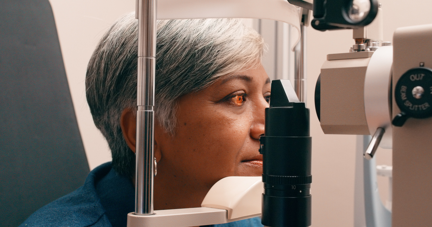 A woman receives an eye exam.